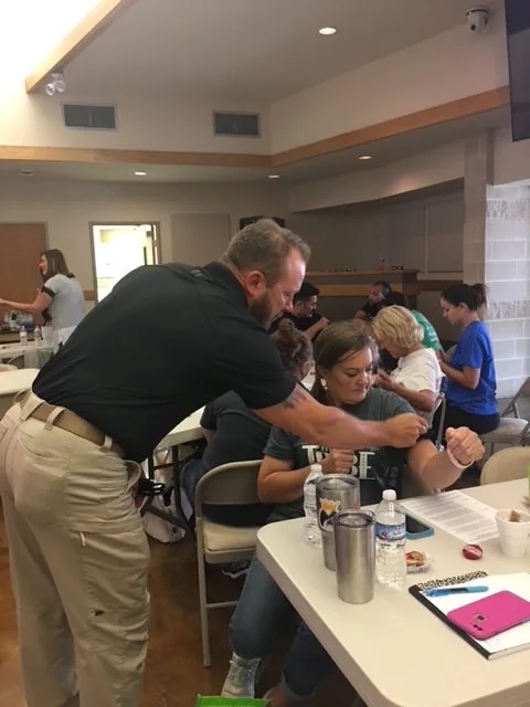 J. Todd Nunley guiding a participant during a classroom training session